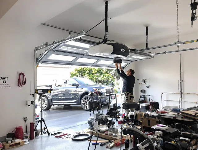 Marblehead Garage Door Repair specialist installing smart garage door opener system in Marblehead home