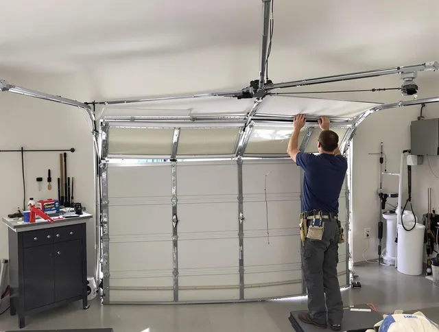 Marblehead Garage Door Repair specialist performing precise section replacement on Marblehead garage door