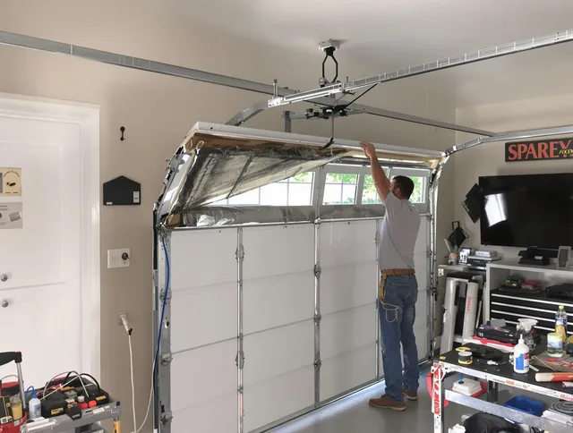 Garage door section replacement by Marblehead Garage Door Repair in Marblehead